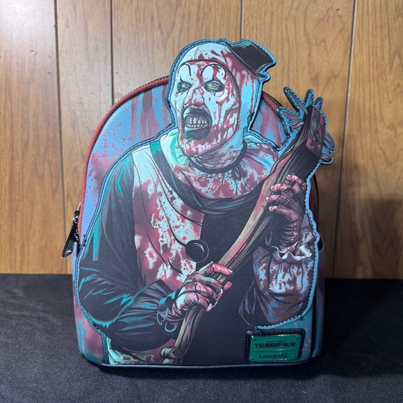 Loungefly Handbags - Loungefly Terrifier Art the Clown Glow in the Dark Mini Backpack EE Exclusive